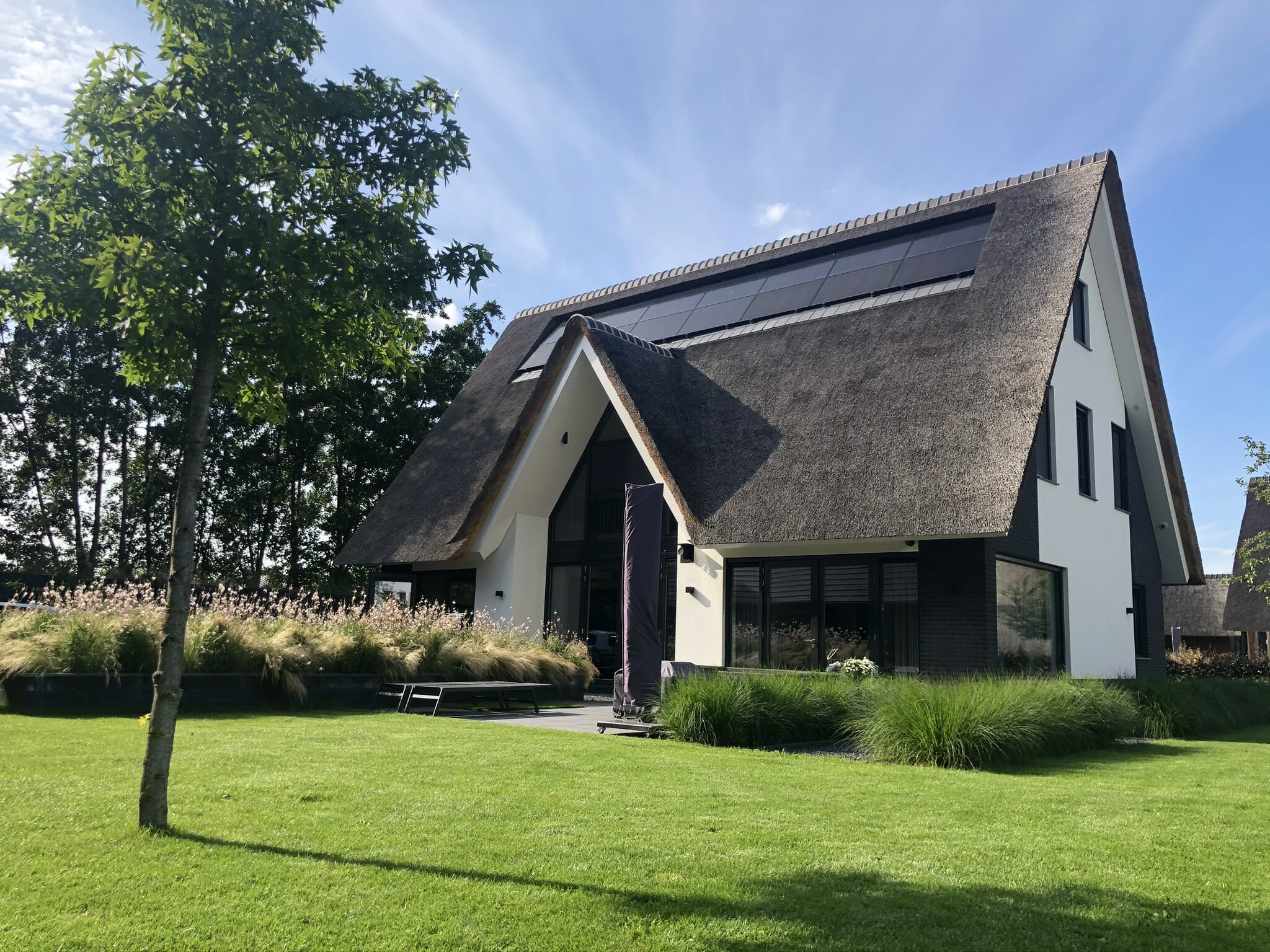 Villa Harderwijk: Een exclusief ontwerp waarin privacy en luxe samenkomen.